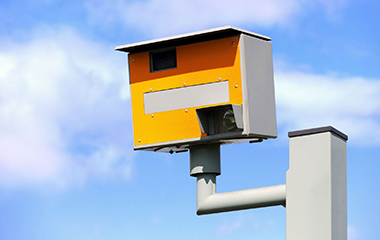 speed camera with clear blue sky in background